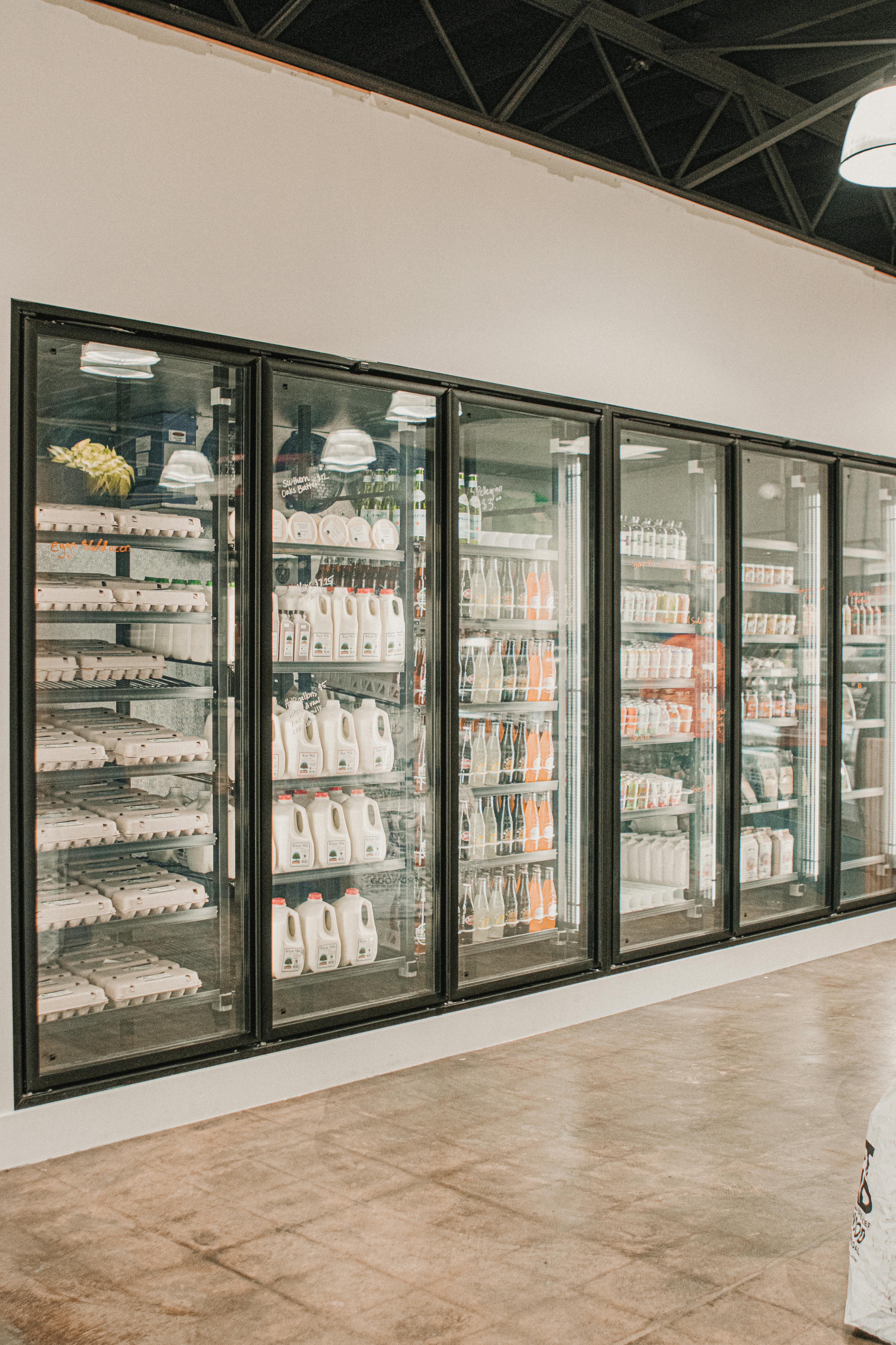 Commercial refrigeration display units and fridges showing professional maintenance services
